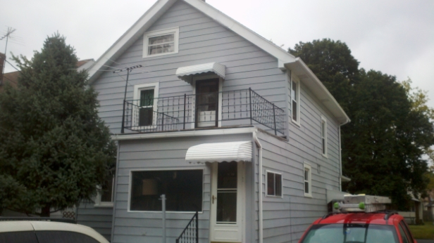 Spraying Aluminum Siding /Restroation